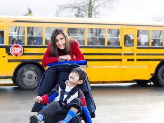 Mom with child in wheel chair